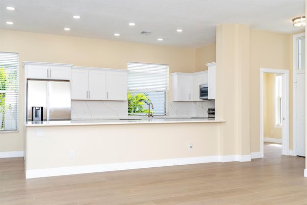 Interior, Kitchen, Recessed Lighting, Stainless Steel Appliances, Wood Texture Flooring