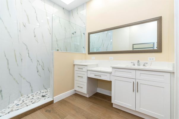 Bathroom, Dual Sink Vanities, Interior, Marble Walls, Wood Texture Flooring