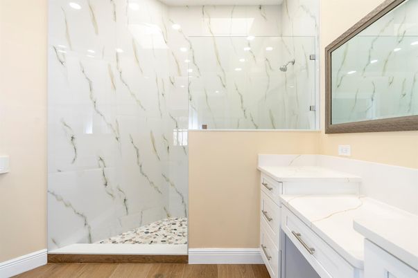 Bathroom, Glass Shower, Interior, Marble Walls, Wood Texture Flooring