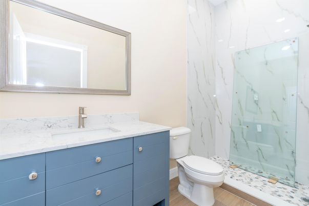 Bathroom, Glass Shower, Interior, Marble Walls, Wood Texture Flooring