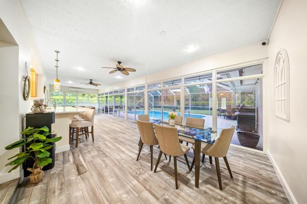 Dining room, Interior, Pendant Lights, Recessed Lighting, Sun Room, Wood Texture Flooring
