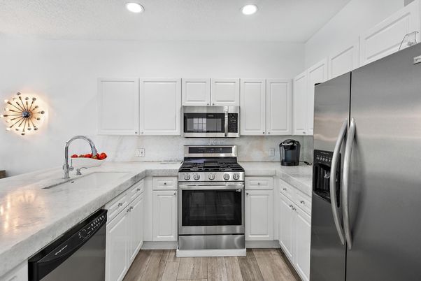Interior, Kitchen, Recessed Lighting, Stainless Steel Appliances, Wood Texture Flooring