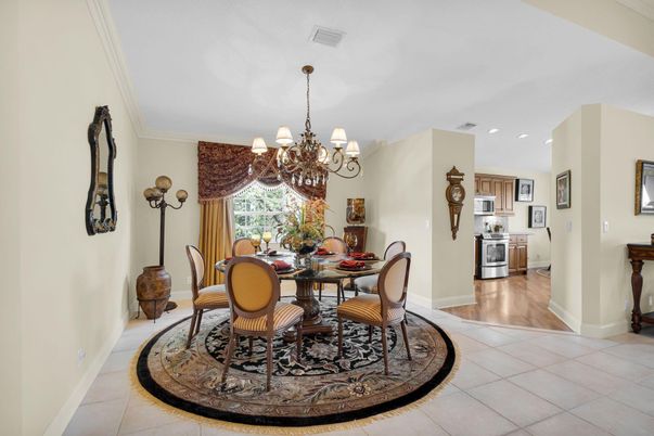 Chandelier, Dining room, Interior, Kitchen, Recessed Lighting, Stainless Steel Appliances, Wood Texture Flooring