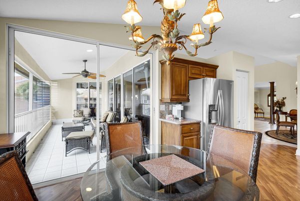 Chandelier, Dining room, Interior, Kitchen, Living room, Recessed Lighting, Wood Texture Flooring