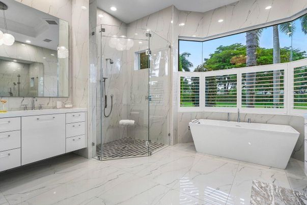 Bathroom, Free Standing Baths, Glass Shower, Interior, Marble, Marble Walls, Pendant Lights, Recessed Lighting