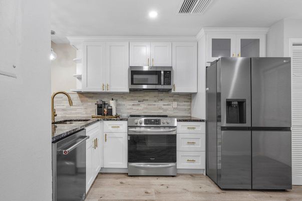 Interior, Kitchen, Recessed Lighting, Stainless Steel Appliances, Wood Texture Flooring