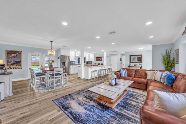 Dining room, Interior, Kitchen, Living room, Pendant Lights, Recessed Lighting, Stainless Steel Appliances, Wood Texture Flooring
