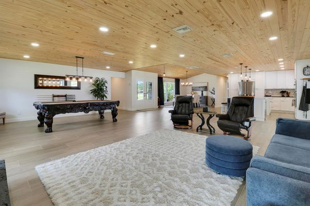 Billiard Table, Game Room, Interior, Living room, Pendant Lights, Recessed Lighting, Wooden Ceilings, Wood Texture Flooring