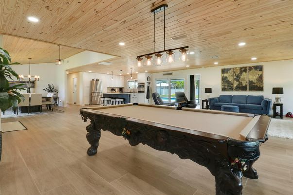 Billiard Table, Chandelier, Dining room, Game Room, Interior, Kitchen, Pendant Lights, Recessed Lighting, Wooden Ceilings, Wood Texture Flooring