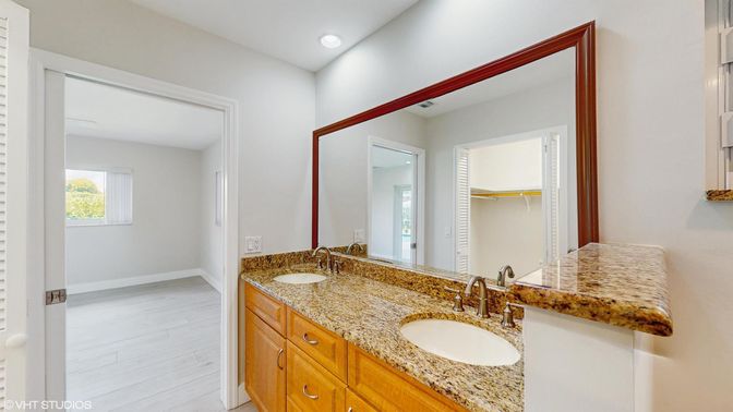 Bathroom, Dual Sink Vanities, Interior, Recessed Lighting, Wood Texture Flooring