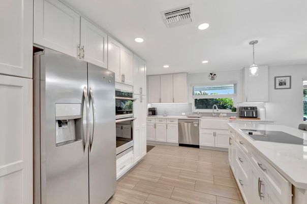 Interior, Kitchen, Pendant Lights, Recessed Lighting, Stainless Steel Appliances, Wood Texture Flooring