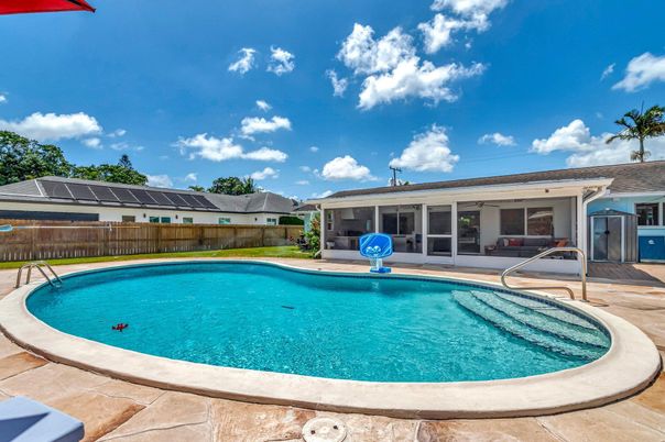 Exterior, Pool, Solar Panels