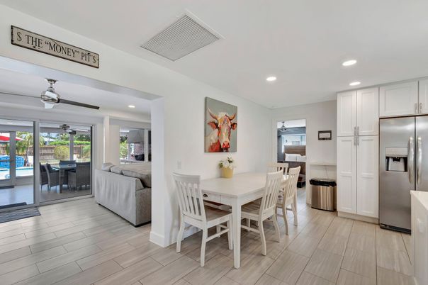 Dining room, Interior, Kitchen, Living room, Recessed Lighting, Stainless Steel Appliances, Wood Texture Flooring