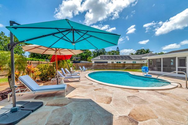 Exterior, Pool, Solar Panels