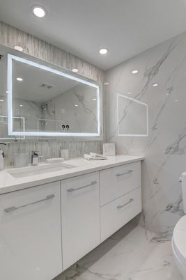 Bathroom, Dual Sink Vanities, Interior, Marble, Marble Walls, Recessed Lighting