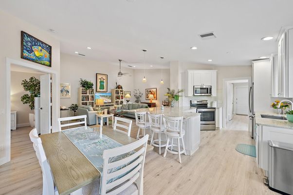 Dining room, Interior, Kitchen, Living room, Pendant Lights, Recessed Lighting, Stainless Steel Appliances, Wood Texture Flooring