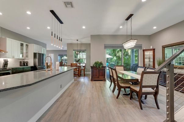 Chandelier, Dining room, Interior, Kitchen, Pendant Lights, Recessed Lighting, Stainless Steel Appliances, Wood Texture Flooring
