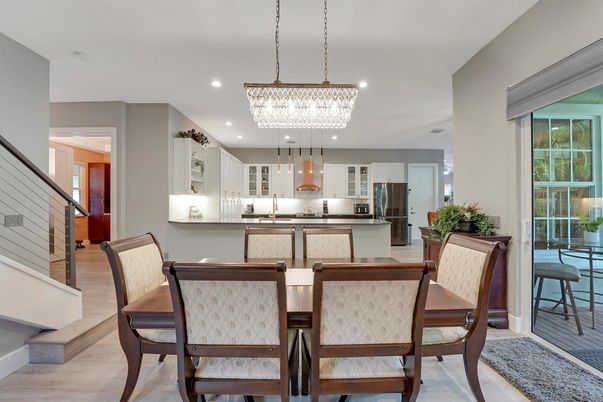 Chandelier, Dining room, Interior, Kitchen, Recessed Lighting, Stainless Steel Appliances, Wood Texture Flooring