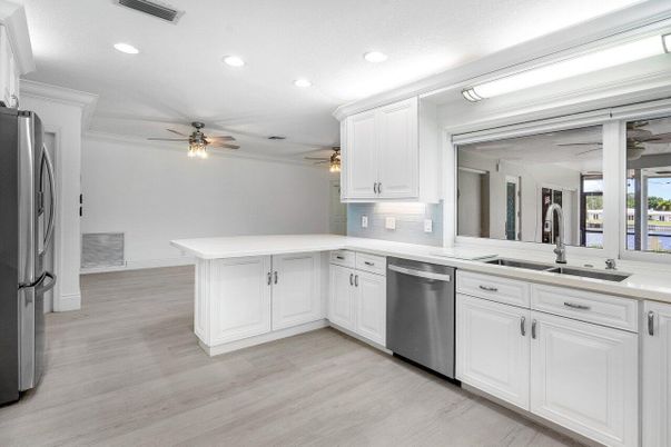 Interior, Kitchen, Recessed Lighting, Stainless Steel Appliances, Wood Texture Flooring