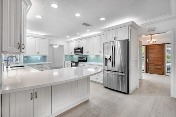 Chandelier, Interior, Kitchen, Recessed Lighting, Stainless Steel Appliances, Wood Texture Flooring