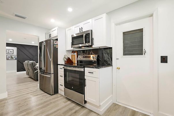 Interior, Kitchen, Recessed Lighting, Stainless Steel Appliances, Wood Texture Flooring