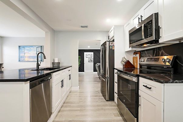 Interior, Kitchen, Recessed Lighting, Stainless Steel Appliances, Wood Texture Flooring