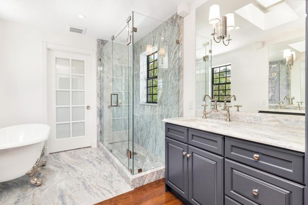 Bathroom, Dual Sink Vanities, Free Standing Baths, Glass Shower, Interior, Marble, Marble Walls, Recessed Lighting, Wood Texture Flooring