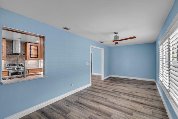Empty room, Interior, Kitchen, Stainless Steel Appliances, Wood Texture Flooring