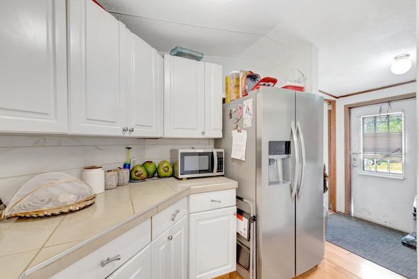 Interior, Kitchen, Tile Countertops, Wood Texture Flooring