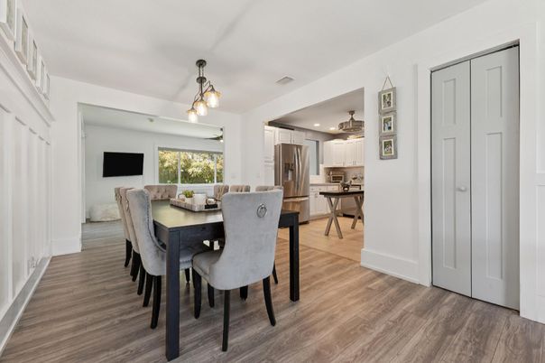 Dining room, Interior, Kitchen, Pendant Lights, Recessed Lighting, Stainless Steel Appliances, Wood Texture Flooring