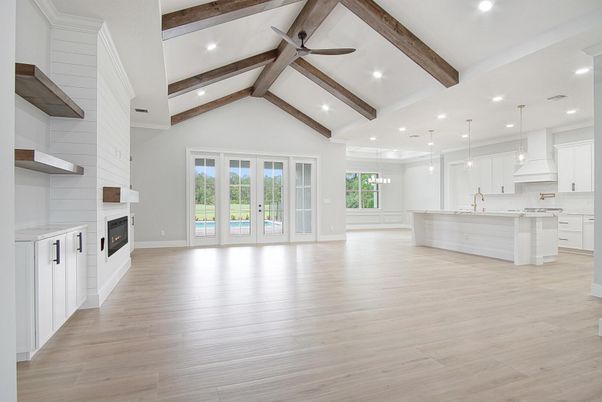 Empty room, Fireplace, Interior, Kitchen, Pendant Lights, Recessed Lighting, Wooden Beams, Wood Texture Flooring