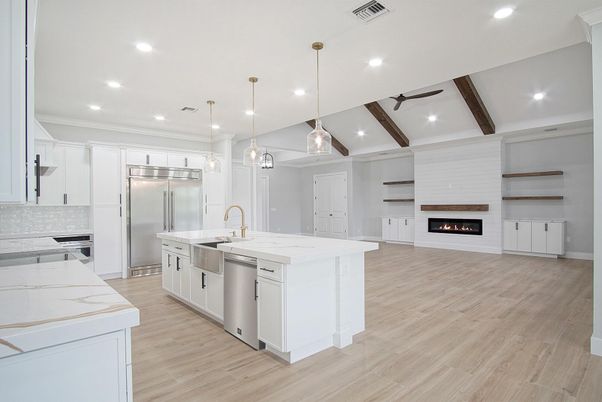 Fireplace, Interior, Kitchen, Pendant Lights, Recessed Lighting, Stainless Steel Appliances, Wooden Beams, Wood Texture Flooring