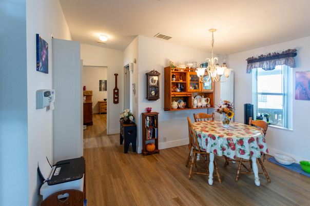 Chandelier, Dining room, Interior, Wood Texture Flooring