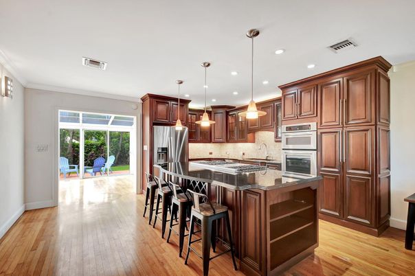 Interior, Kitchen, Pendant Lights, Recessed Lighting, Stainless Steel Appliances, Wood Texture Flooring
