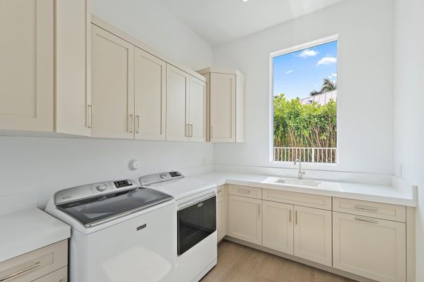 Interior, Kitchen, Recessed Lighting, Washer, Wood Texture Flooring