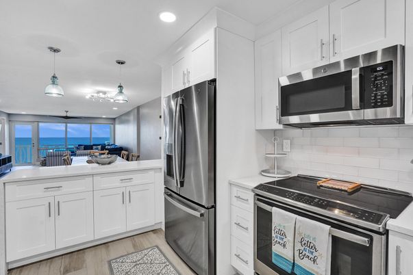Interior, Kitchen, Pendant Lights, Recessed Lighting, Stainless Steel Appliances, Water, Wood Texture Flooring