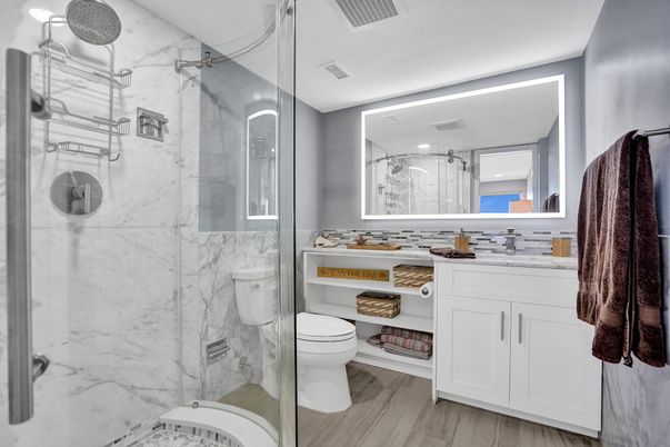Bathroom, Glass Shower, Interior, Marble Walls, Recessed Lighting, Wood Texture Flooring