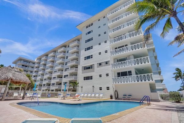 Exterior, Facade, Pool, Condo Building