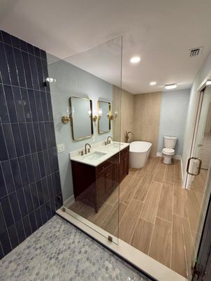 Bathroom, Dual Sink Vanities, Free Standing Baths, Glass Shower, Interior, Recessed Lighting, Wood Texture Flooring