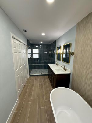 Bathroom, Dual Sink Vanities, Free Standing Baths, Glass Shower, Interior, Recessed Lighting, Wood Texture Flooring