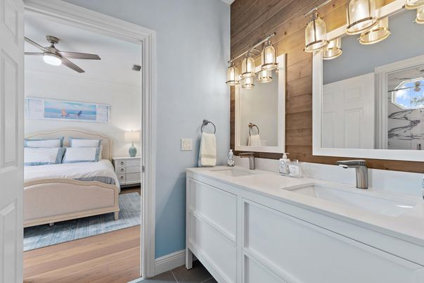 Bathroom, Bedroom, Dual Sink Vanities, Interior, Wood Texture Flooring, Wooden Walls