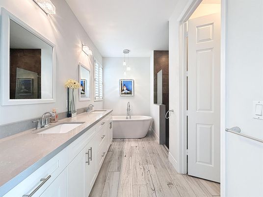 Bathroom, Dual Sink Vanities, Free Standing Baths, Interior, Pendant Lights, Wood Texture Flooring