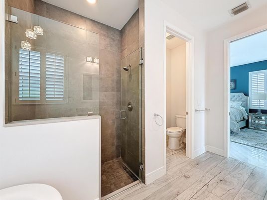 Bathroom, Bedroom, Glass Shower, Interior, Recessed Lighting, Wood Texture Flooring