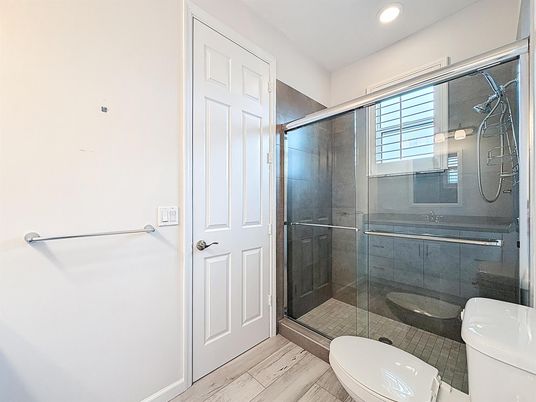 Bathroom, Glass Shower, Interior, Recessed Lighting, Wood Texture Flooring