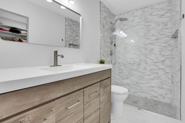Bathroom, Dual Sink Vanities, Glass Shower, Interior, Marble, Marble Walls