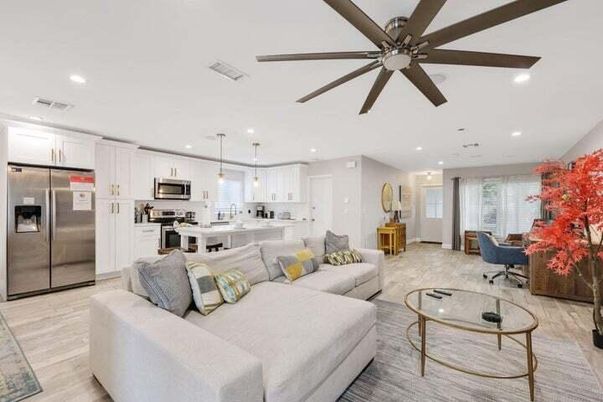 Dining room, Interior, Kitchen, Living room, Pendant Lights, Recessed Lighting, Stainless Steel Appliances, Wood Texture Flooring