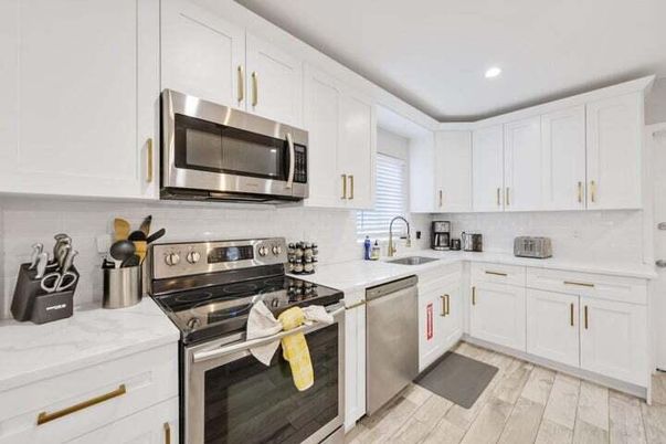 Interior, Kitchen, Recessed Lighting, Stainless Steel Appliances, Wood Texture Flooring