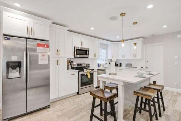 Interior, Kitchen, Pendant Lights, Recessed Lighting, Stainless Steel Appliances, Wood Texture Flooring
