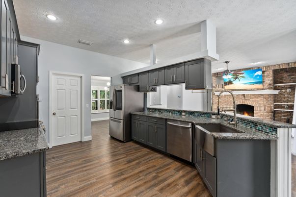 Fireplace, Interior, Kitchen, Recessed Lighting, Stone Walls, Wood Texture Flooring