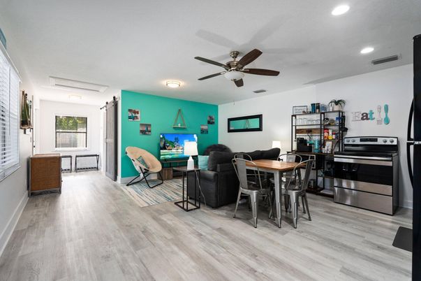Dining room, Interior, Kitchen, Recessed Lighting, Stainless Steel Appliances, Wood Texture Flooring